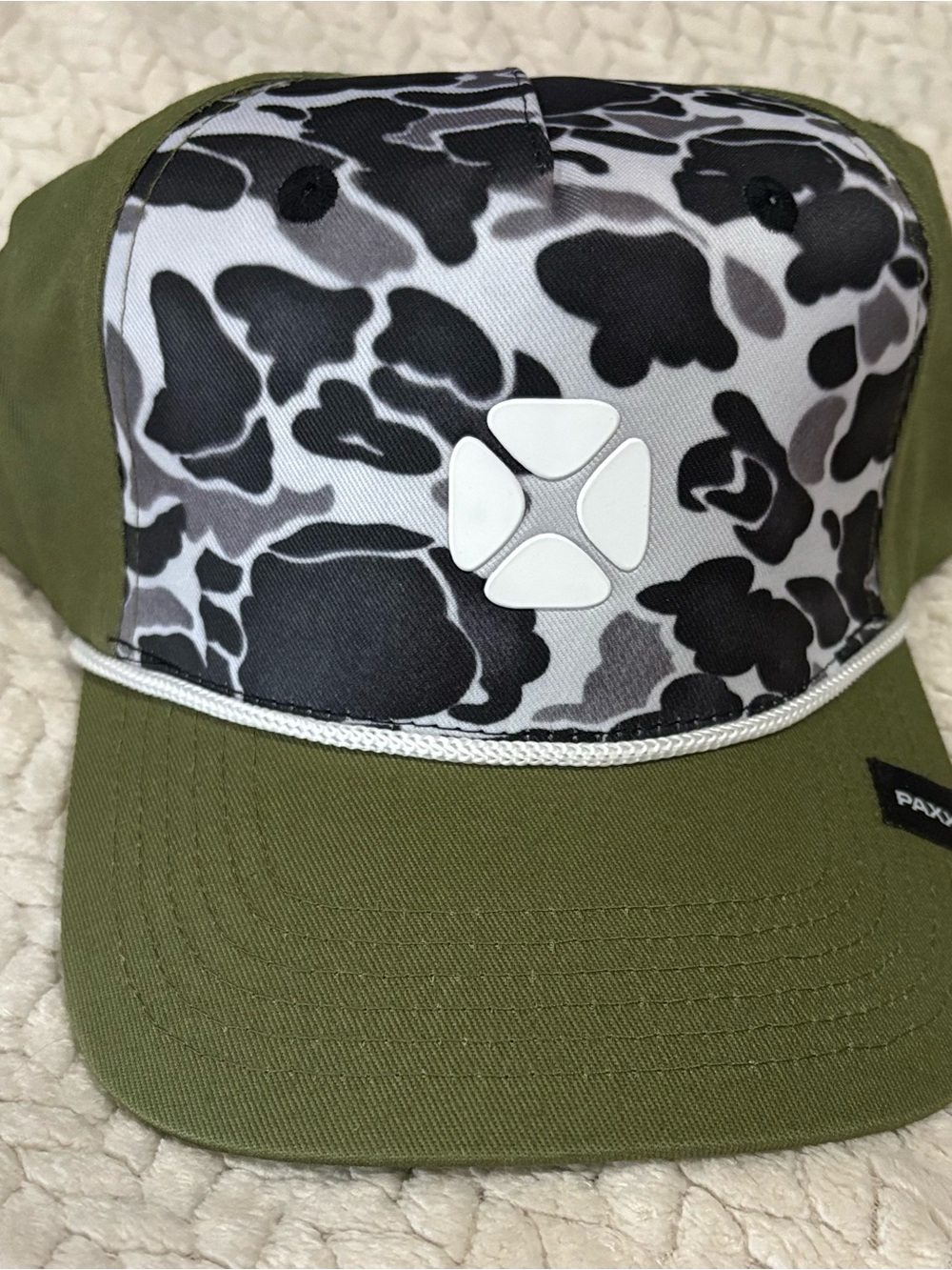 Olive Green Trucker Hat with Black & White Camo Front and White Emblem